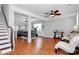 Bright living room featuring hardwood floors, open floor plan, and neutral paint scheme at 815 Oak Embers Se Dr, Concord, NC 28025