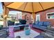 Outdoor patio with wicker furniture and grill, perfect for enjoying alfresco dining and gatherings at 815 Oak Embers Se Dr, Concord, NC 28025