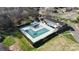Aerial shot of a community pool surrounded by privacy landscaping and nearby parking at 8322 Knights Bridge Rd, Charlotte, NC 28210