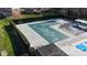 Community pool featuring privacy landscaping, large pool deck and covered lounge area for residents at 8322 Knights Bridge Rd, Charlotte, NC 28210
