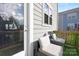 Outdoor space with comfortable seating and artificial turf, perfect for relaxation at 840 Imperial Ct, Charlotte, NC 28273