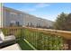 Cozy backyard deck with artificial turf and lounge seating at 840 Imperial Ct, Charlotte, NC 28273