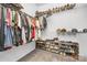 Walk-in closet with clothing racks, shelves, and shoe storage at 840 Imperial Ct, Charlotte, NC 28273