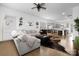 Open-concept living area featuring hardwood floors, neutral decor, and seamless flow to the kitchen at 840 Imperial Ct, Charlotte, NC 28273