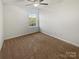 Cozy bedroom with neutral carpet, ample natural light from the window at 9154 Bradstreet Commons Way, Charlotte, NC 28215