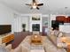 Cozy living room with fireplace, stylish furnishings, and an open floor plan at 9407 Seamill Rd, Charlotte, NC 28278