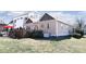 View of the home's backyard featuring a wooden deck and well-maintained grassy area at 1001 Parkwood Ave, Charlotte, NC 28205