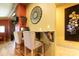 Dining area with breakfast bar, marble countertop, and unique wall decor at 1001 Parkwood Ave, Charlotte, NC 28205