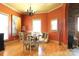 Bright dining room features hardwood floors, chandelier lighting, and natural light at 1001 Parkwood Ave, Charlotte, NC 28205