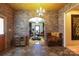 Grand foyer showcases stone accents and decorative tile flooring, leading to living spaces at 1001 Parkwood Ave, Charlotte, NC 28205