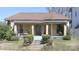 Charming single-story home with a welcoming front porch and well-maintained landscaping at 1001 Parkwood Ave, Charlotte, NC 28205