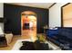 Elegant living room with an open archway that looks into the home's dining area at 1001 Parkwood Ave, Charlotte, NC 28205