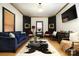 Sophisticated living room boasts designer touches and natural light at 1001 Parkwood Ave, Charlotte, NC 28205
