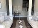 Inviting living room with stylish decor, featuring an elegant staircase and neutral furniture, offering a comfortable space at 1005 Cherry Laurel Dr, Waxhaw, NC 28173