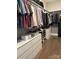 Spacious walk-in closet with organized clothing racks, shelves for shoes, and storage drawers at 1005 Cherry Laurel Dr, Waxhaw, NC 28173