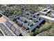 A charming neighborhood showcases well-maintained townhomes, mature trees, and meticulously kept landscaping at 1037 Pierre Dr, Charlotte, NC 28205