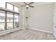 Bright, airy bedroom with soaring ceilings, and expansive windows offer ample natural light at 1037 Pierre Dr, Charlotte, NC 28205