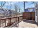 A wooden deck with railings offering a view of the surrounding neighborhood at 1037 Pierre Dr, Charlotte, NC 28205