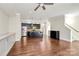 This large living room seamlessly connects the kitchen and staircase at 1037 Pierre Dr, Charlotte, NC 28205