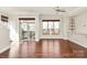 Bright living room with hardwood floors and large windows providing plenty of natural light at 1037 Pierre Dr, Charlotte, NC 28205