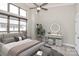 Bright main bedroom with large window, high ceilings, modern decor, and a stylish vanity at 1037 Pierre Dr, Charlotte, NC 28205