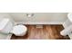 Elegant powder room with modern fixtures and hardwood flooring at 1037 Pierre Dr, Charlotte, NC 28205
