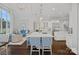 Bright kitchen with stainless steel appliances, marble countertops, and island with seating at 13500 Robert Walker Dr, Davidson, NC 28036