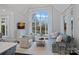 Comfortable living room with a large window, stylish furnishings, and lots of natural light at 13500 Robert Walker Dr, Davidson, NC 28036
