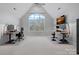 Spacious home office with high ceilings, natural light, and dual workstations with sleek monitors at 13500 Robert Walker Dr, Davidson, NC 28036