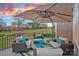 Outdoor patio features comfortable seating and stunning sunset views at 13500 Robert Walker Dr, Davidson, NC 28036