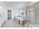 Bright bathroom with a shower and tub at 136 Glenn Dr, Mooresville, NC 28115