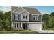 Charming two-story home featuring gray siding, a covered porch, an attached garage, and well-maintained landscaping at 136 Glenn Dr, Mooresville, NC 28115
