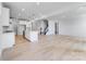 Open floorplan features a spacious living room and kitchen with an island at 136 Glenn Dr, Mooresville, NC 28115