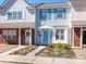 Charming townhome featuring light blue siding and well-maintained landscaping at 13684 Meade Glen Ct, Charlotte, NC 28273