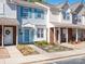 Charming townhome featuring light blue siding and well-maintained landscaping at 13684 Meade Glen Ct, Charlotte, NC 28273