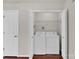 Laundry room includes washer, dryer and shelving for storage at 13684 Meade Glen Ct, Charlotte, NC 28273