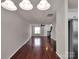 Bright living room featuring hardwood floors and open layout at 13684 Meade Glen Ct, Charlotte, NC 28273