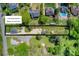Expansive aerial view of property at 1532 South Point Rd, highlighting a large lot with mature trees at 1532 South Point Rd, Belmont, NC 28012