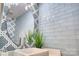 Charming bathroom features patterned and subway tile and a modern vessel sink at 1532 South Point Rd, Belmont, NC 28012