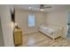 Guest bedroom featuring a trundle bed, hardwood floors, and a ceiling fan at 1532 South Point Rd, Belmont, NC 28012