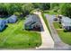 Charming home with inviting front porch, manicured lawn, and long driveway leading to the house at 1532 South Point Rd, Belmont, NC 28012