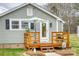 Charming front porch with seating and landscaping; perfect for relaxing at 1532 South Point Rd, Belmont, NC 28012