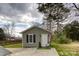 Charming guest house with a welcoming porch and well-manicured landscaping at 1532 South Point Rd, Belmont, NC 28012