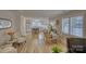 Spacious living room featuring an open floor plan, hardwood floors and views into the kitchen at 1532 South Point Rd, Belmont, NC 28012