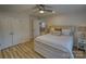 Comfortable main bedroom showcases hardwood floors and convenient closet space at 1532 South Point Rd, Belmont, NC 28012