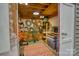 A small, organized shed is filled with shelves, storage, and wreaths at 1532 South Point Rd, Belmont, NC 28012