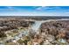 Amazing aerial view of a lakeside community featuring waterfront homes with private docks and gazebos at 156 Hazelton Loop, Mooresville, NC 28117
