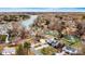 Panoramic aerial view of a residential area with lake access and multiple waterfront properties at 156 Hazelton Loop, Mooresville, NC 28117