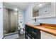 Modern bathroom features a glass-enclosed shower, stylish vanity with vessel sink, and contemporary fixtures at 156 Hazelton Loop, Mooresville, NC 28117