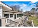 Lovely deck with lake view, featuring composite decking, and black aluminum railings at 156 Hazelton Loop, Mooresville, NC 28117